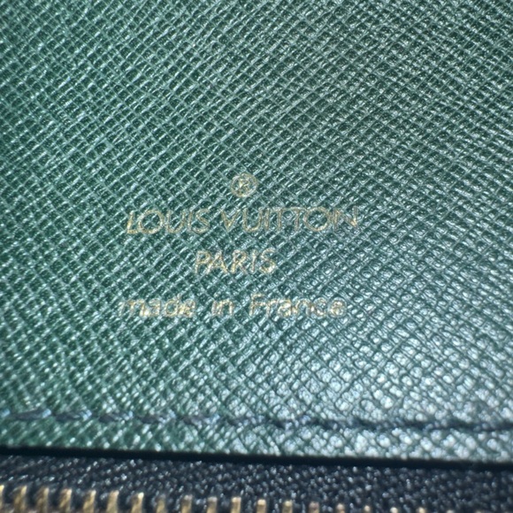 Louis Vuitton Tiaga Leather Clutch - Picture 12 of 12